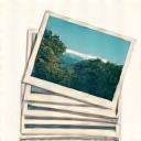 A graphic of stacked digital photos.